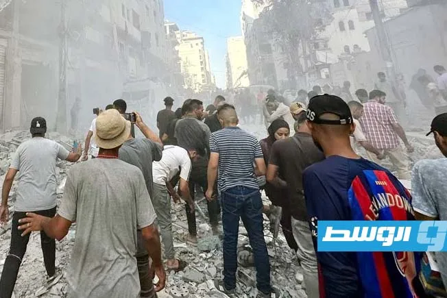 إسرائيل تُنفذ مجزرة في حي الرمال.. 19 قتيلاً نتيجة غارة على مبنى سكني ومخبز غرب غزة إسرائيل تُنفذ مجزرة في حي الرمال.. 19 قتيلاً نتيجة غارة على مبنى سكني ومخبز غرب غزة