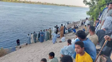 استعادة جثة شاب من أسيوط غرق في نهر النيل بإسنا – صور