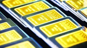 استقرار الذهب مع صعود الدولار قبل فرض رسوم جمركية جديدة
