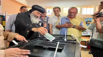 بعلم مصر.. مطران بورسعيد يشارك في انتخابات مجلس الشيوخ – صور