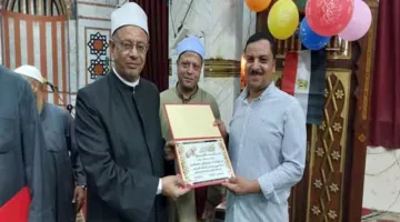 مديرية أوقاف سوهاج ت honored الزميل عمار عبدالواحد خلال احتفال بالمولد النبوي الشريف.
